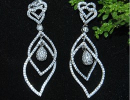 Petal Shaped Entwined Sterling Silver Dangler Earrings